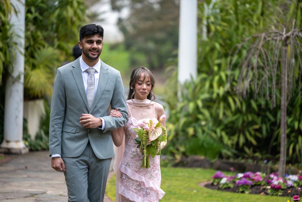 Bridal party walking along the footpath at The Manor