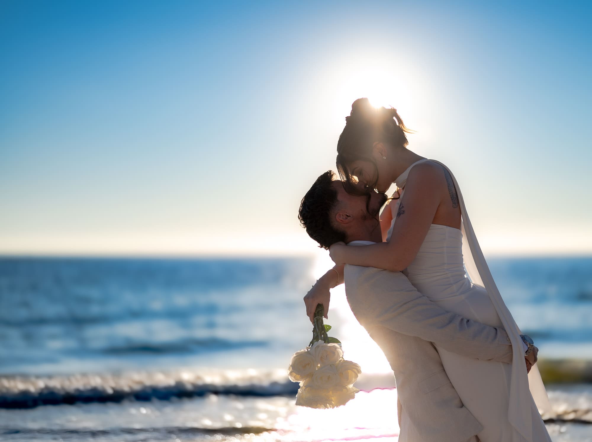 Halley and Jay wedding photo at Glenelg Beach, South Australia