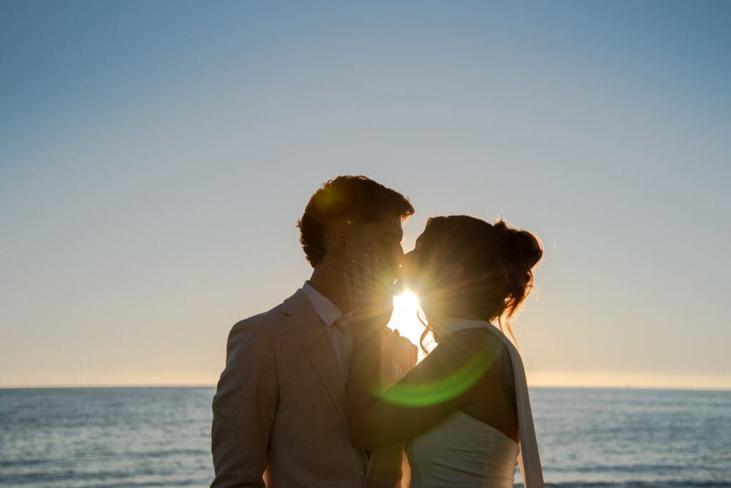 Halley and Jay wedding photos at Glenelg Beach at sunset